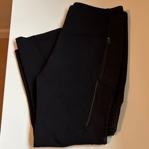 Black Lululemon Capri Leggings with Mesh Detailing